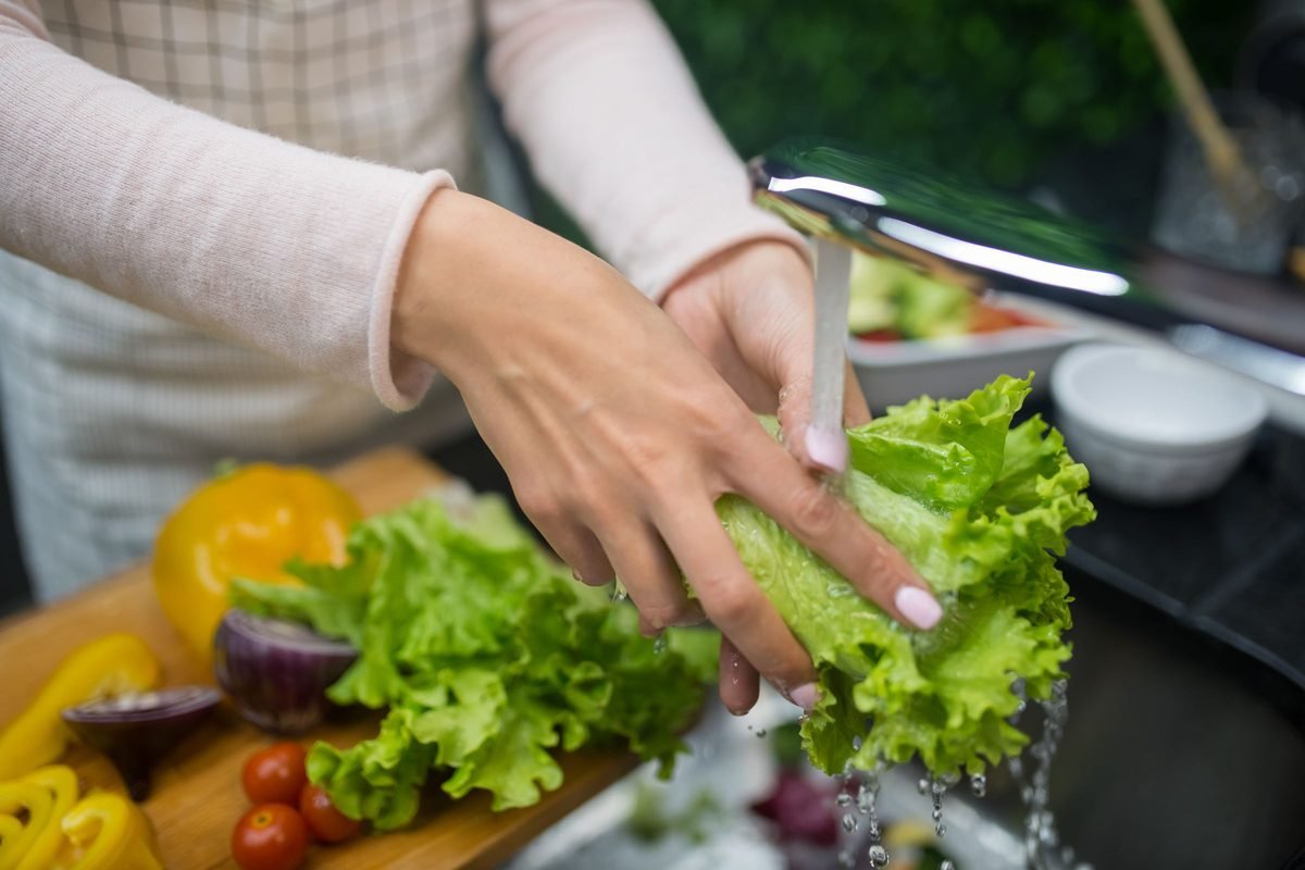 Preparing fresh greens in a home kitchen
